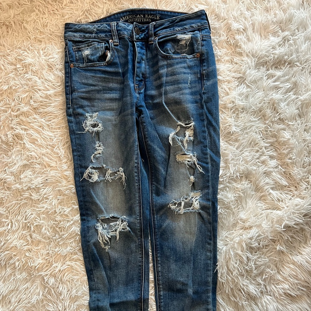 American eagle distressed tom girl jeans, size 6, hit just above the ankle.